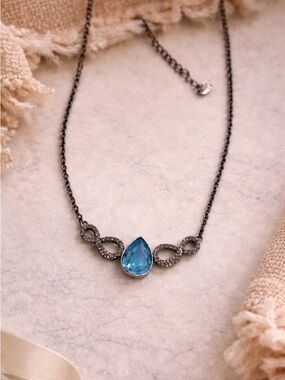 Teardrop Blue Crystal Infinity Necklace - gunmetal finish 16-18”